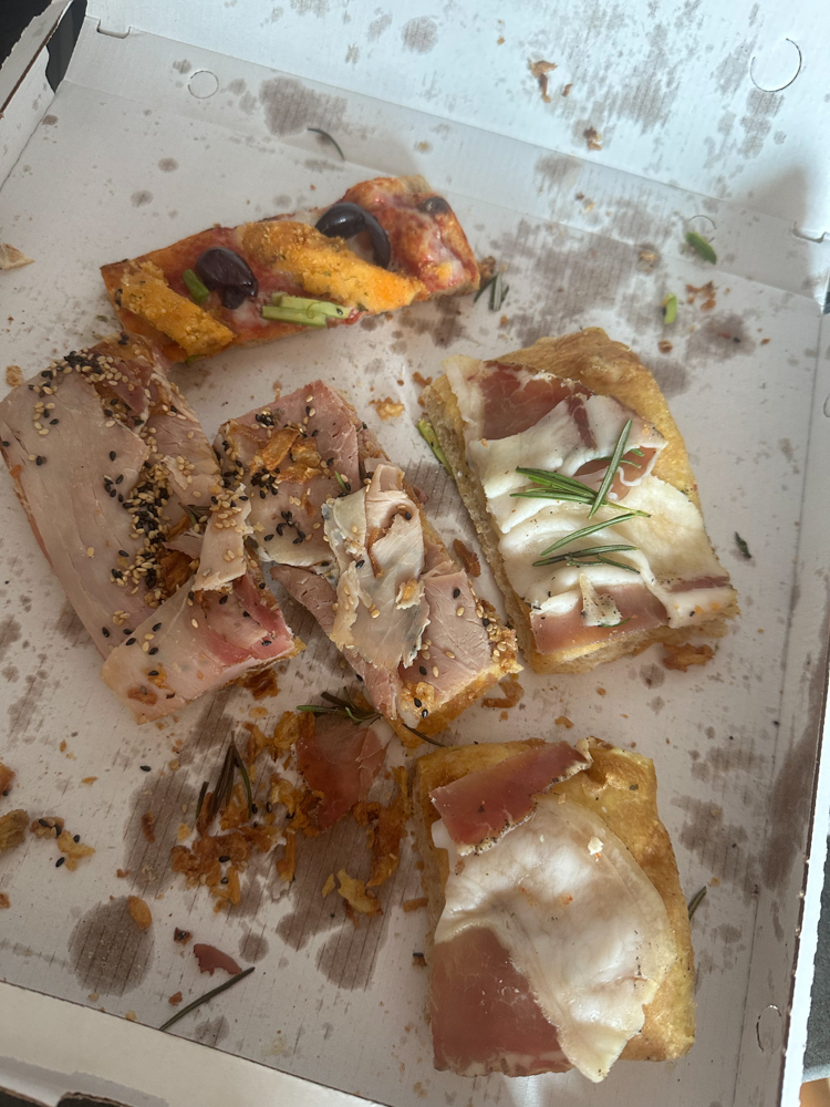 Remnants of a pizza, destroyed